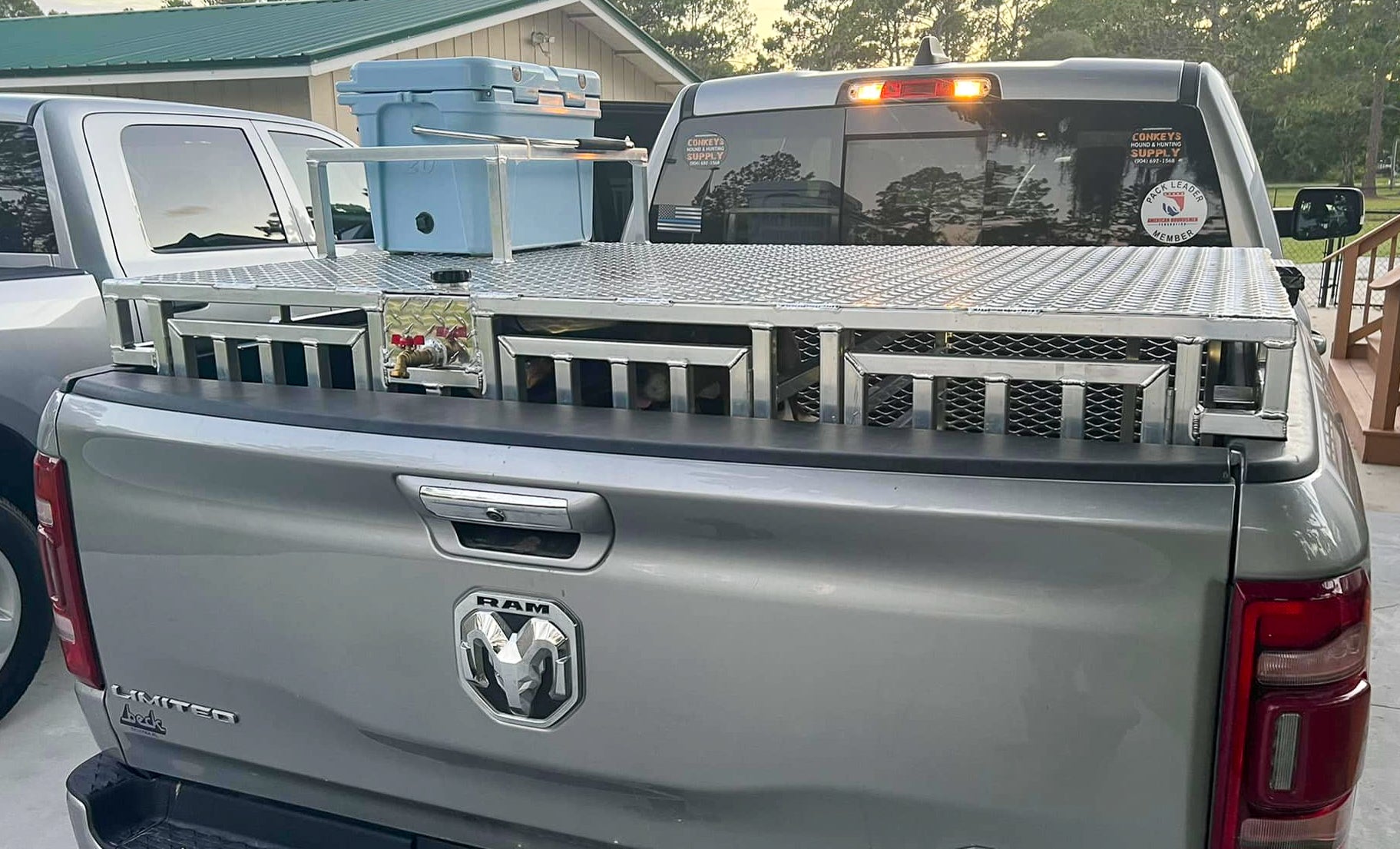 dogs wth fishing poles in truck TOPLINE
